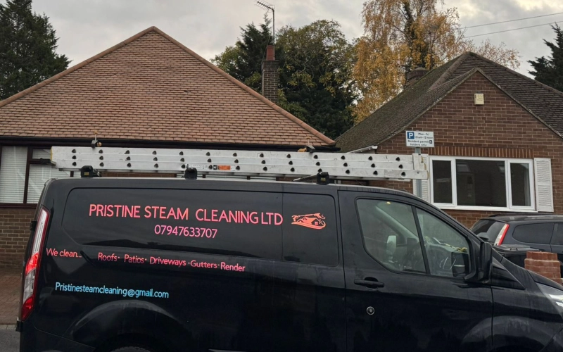 Moss removal on tiled roof in Nascot Wood, Watford — roof cleaning specialists restoring tiles and improving drainage.